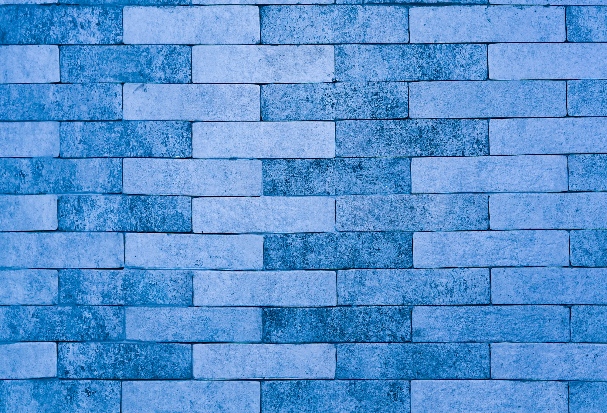 Brick textured blue wall background. brick wall backdrop